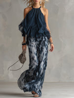 Marie | Ensemble élégant avec haut dos nu bleu marine et pantalon large imprimé